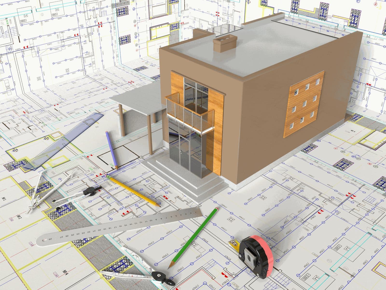 A model building resting on architectural plans with drawing tools